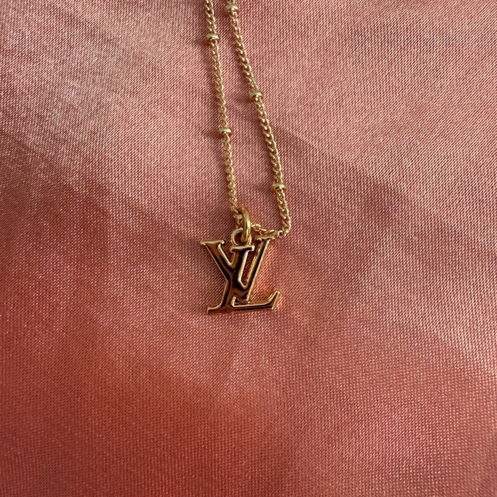 Elegant Gold Necklace with Louis Vuitton Pendant